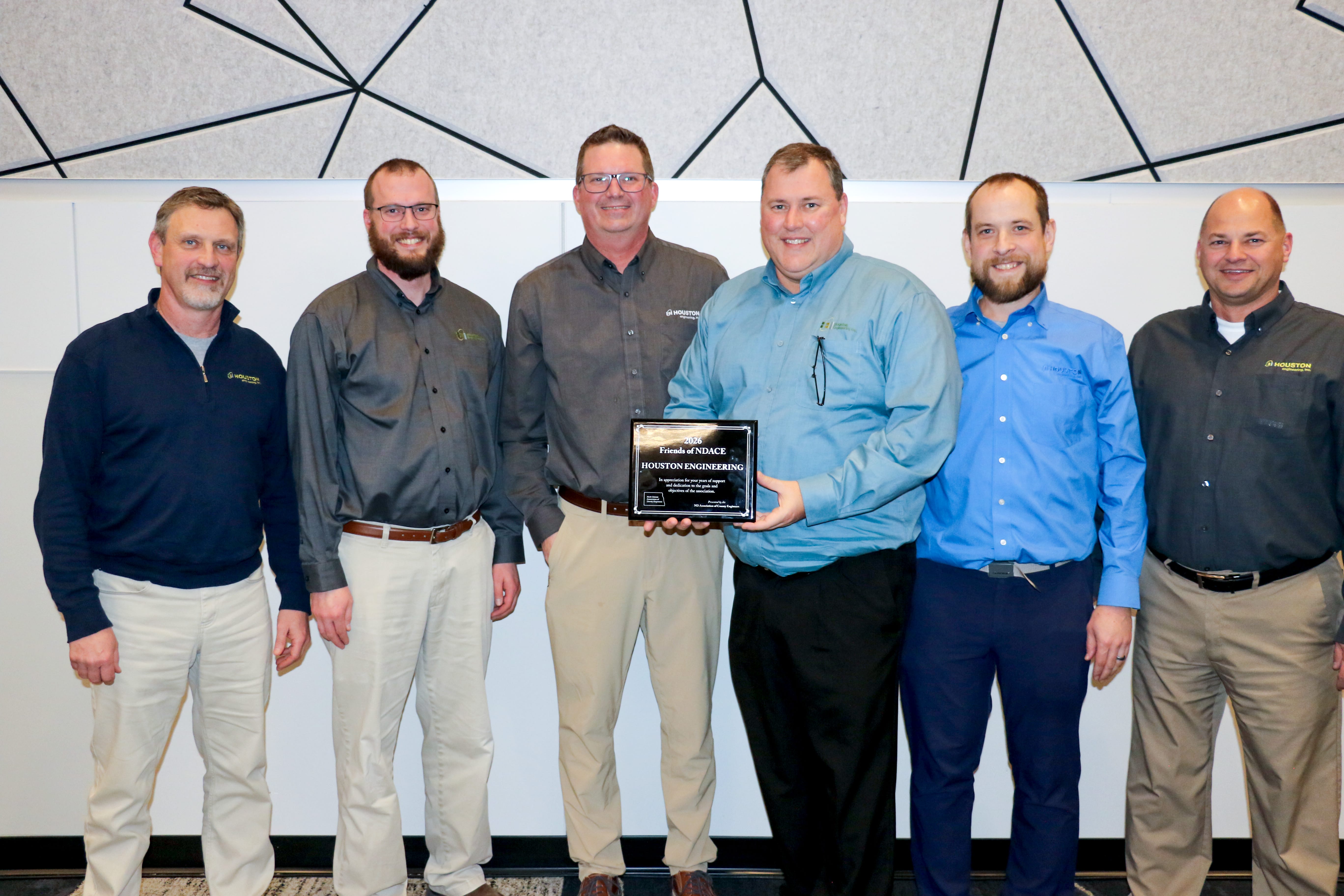 HEI team accepting NDACE Friends of NDACE Award