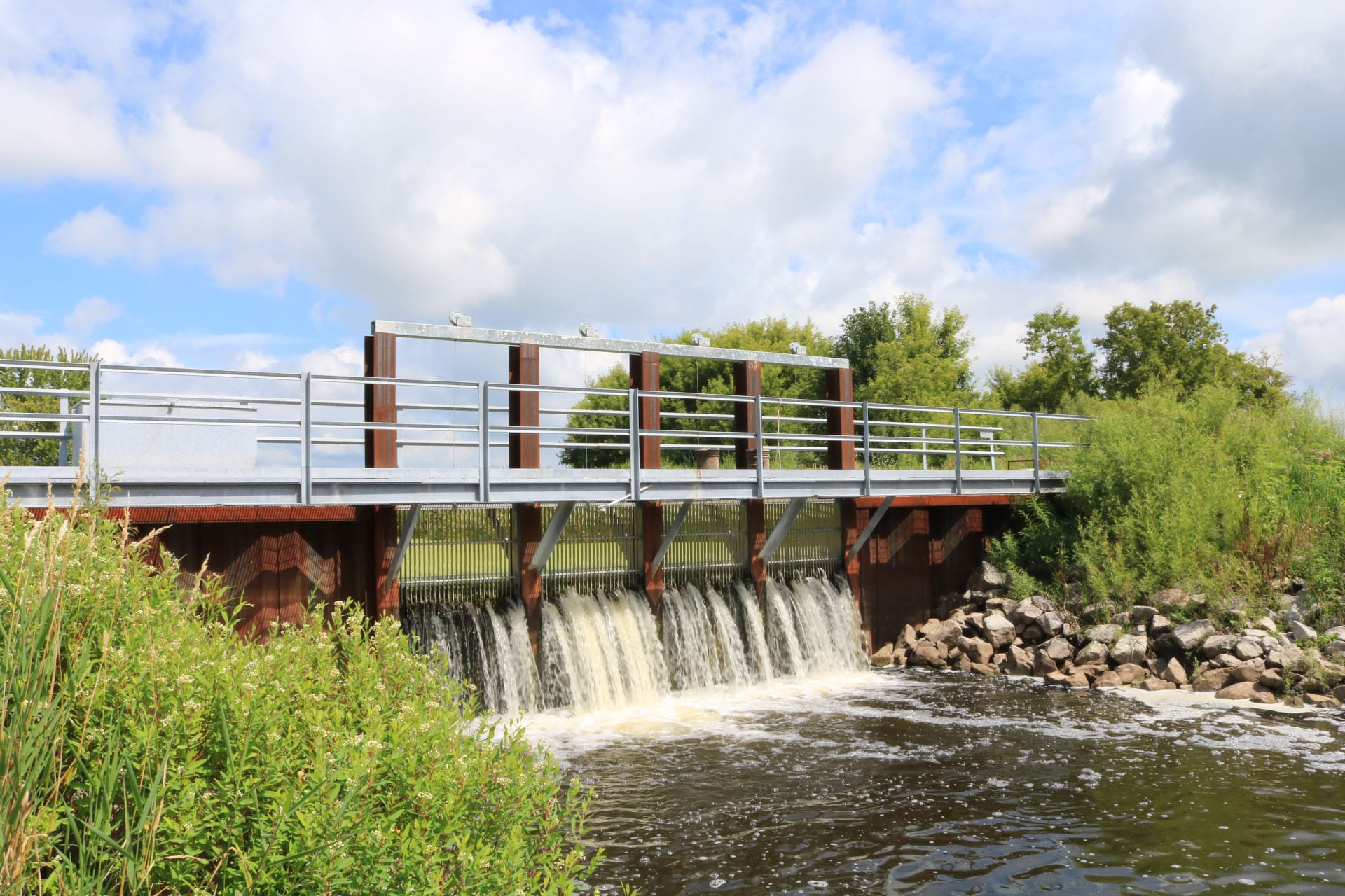 Completed photo of the High Island Creek Lake Outlet Replacement project Taken summer 2025.